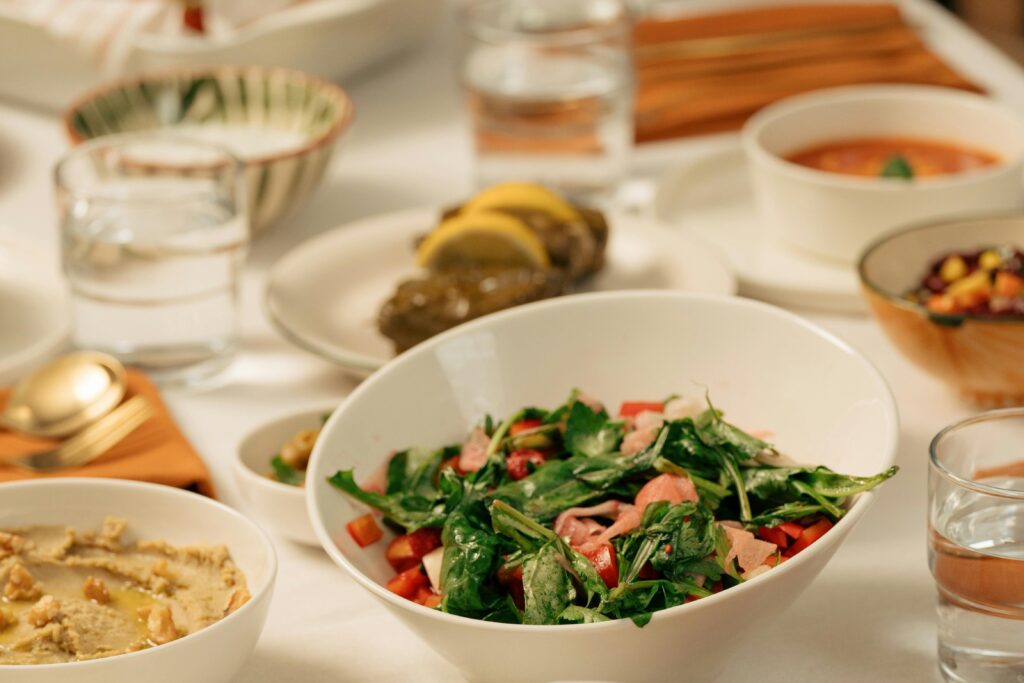 Hummus (left), and salad (middle), make for healthy iftar options