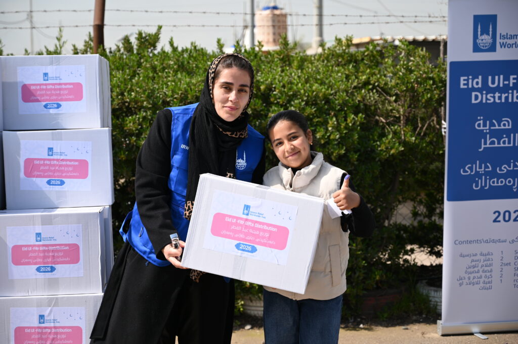 Young girl receiving an eid gift for Eid Al Fitr